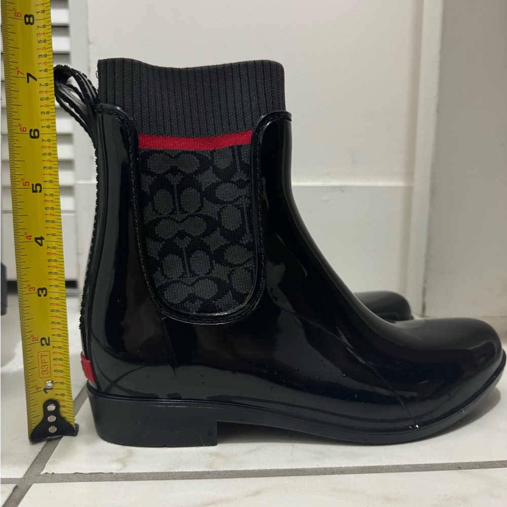 Nwot Patent black coach boots.